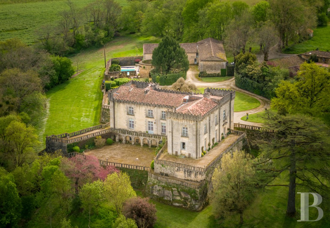 Castles / chateaux for sale - poitou-charentes - A 17th century chateau and its terraces registered as historical monuments, outbuildings, parkland and underground spring, set in 8 hectares of grounds overlooking the Charente valley 