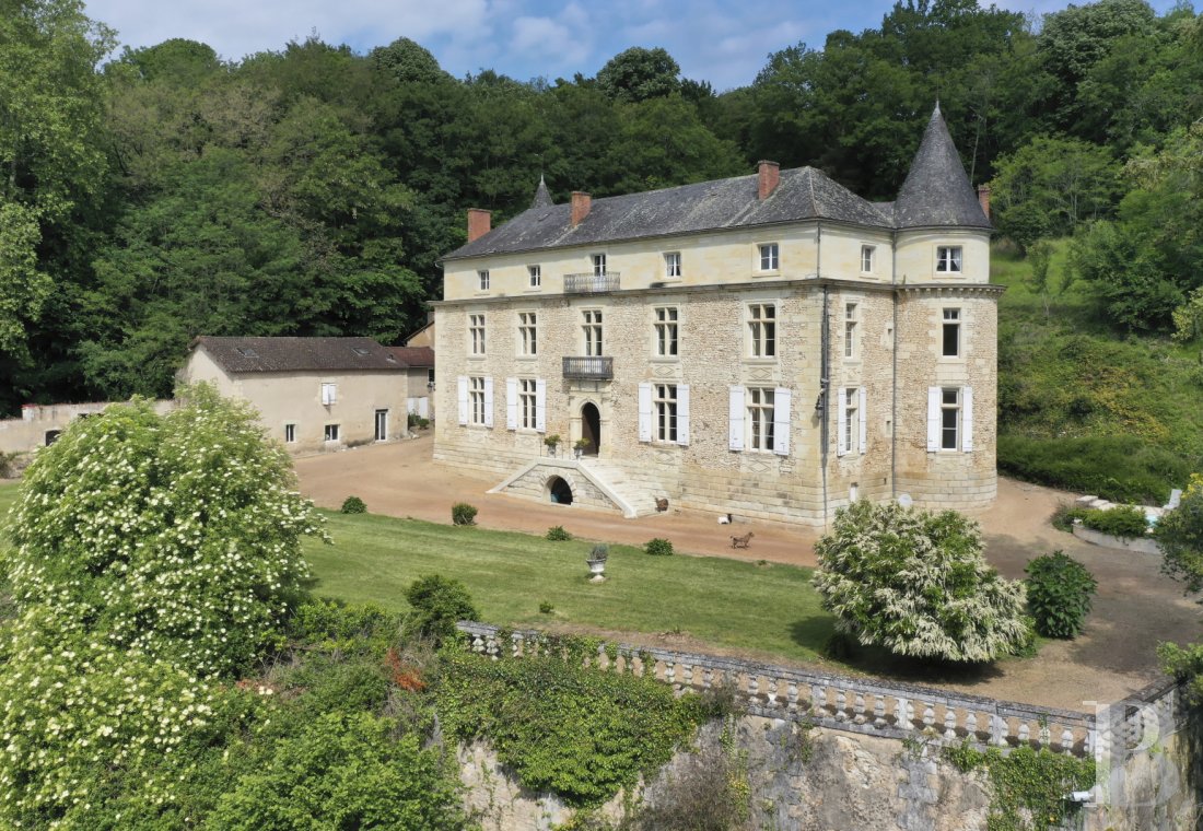 Castles / chateaux for sale - aquitaine - A 16th century castle, all of its furniture, its outbuildings on terraced grounds on an 18-hectare wooded hillside dominating the Isle Valley on the outskirts of Périgueux