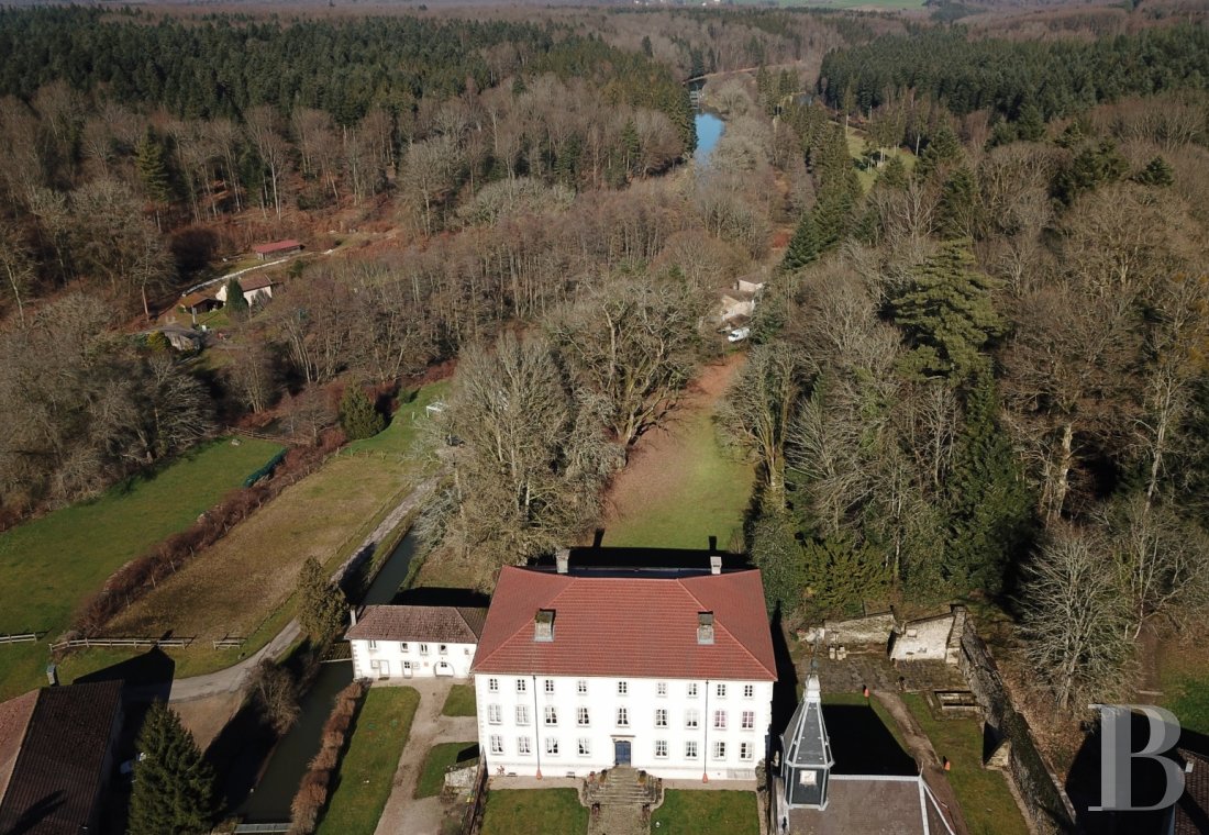 A 18th century royal factory now surrounded by nature between river and forest, to the south of Lorraine - photo  n°1