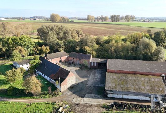 A traditional Walloon farm complex with two hectares of land, nestled  between the cities of Mons and Brussels in Belgium’s ...