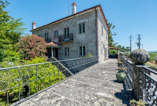 An elegant house with a lush orchard and a covered swimming pool,  nestled in Nelas, a charming town in the centre of Portugal