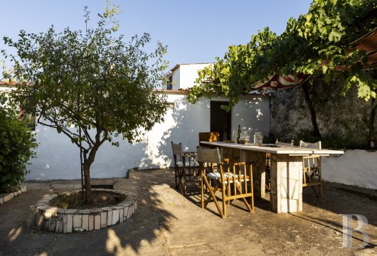 On a historic street in Estremoz, a 16th-century residence with walls steeped in literary history.