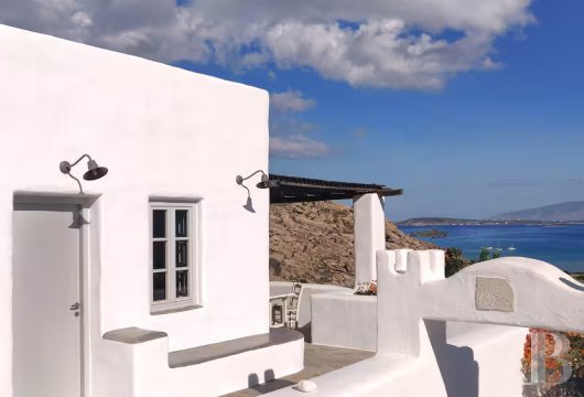 Above Kolymbithres, a 133 m² Cycladic house on 2,800 m² of land with panoramic views of Naoussa Bay.