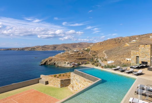 In Kea, an architect-designed villa overlooking the Aegean Sea, featuring terraces and a Mediterranean garden
