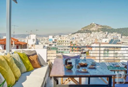 In Athens, on the 8th floor, an apartment with large terraces