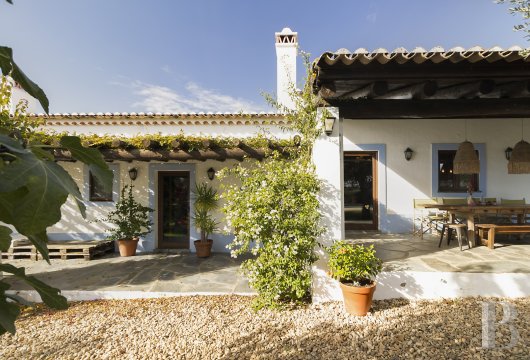 In the Alentejo, at the foot of the Serra, a century-old 4.3-hectare property with separate outbuildings and an ...