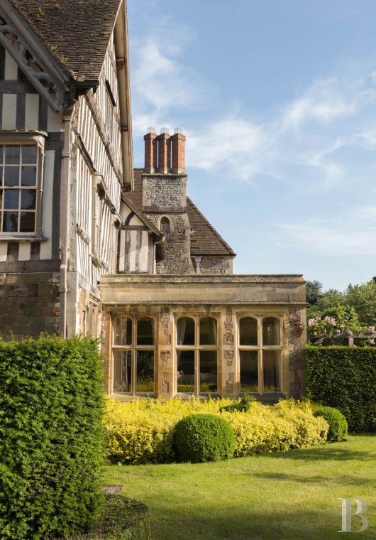 In Malvern,<br/>a medieval house originally a 12th-century priory, with Victorian gardens and some 15 hectares of parkland overlooking the Severn Valley