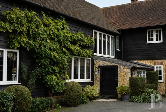 In Shamley Green, in the heart of the Surrey Hills, an early 19th-century property with a detached cottage, a tennis ...
