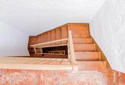 In the Contramurada neighbourhood of Ciutadella, an old house spread over three floors