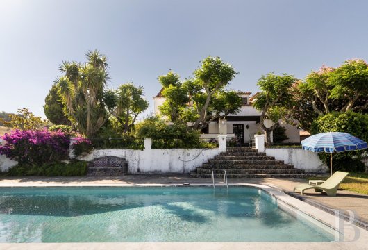 In the Serra da Arrábida Natural Park, a 350 m² home with views of the Tagus Estuary