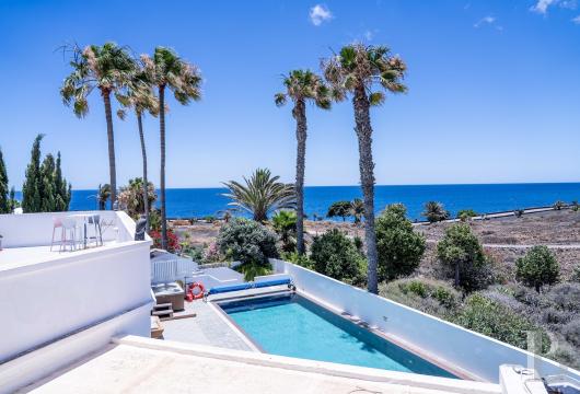 In Costa Teguise, a 1993 architect-designed villa on the waterfront