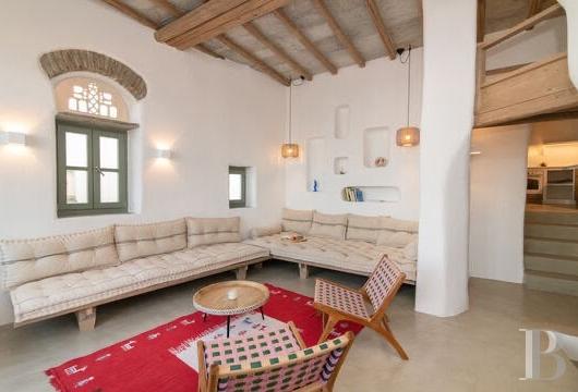 On the island of Tinos, in the village of Arnados, a restored Cycladic house overlooking the sea